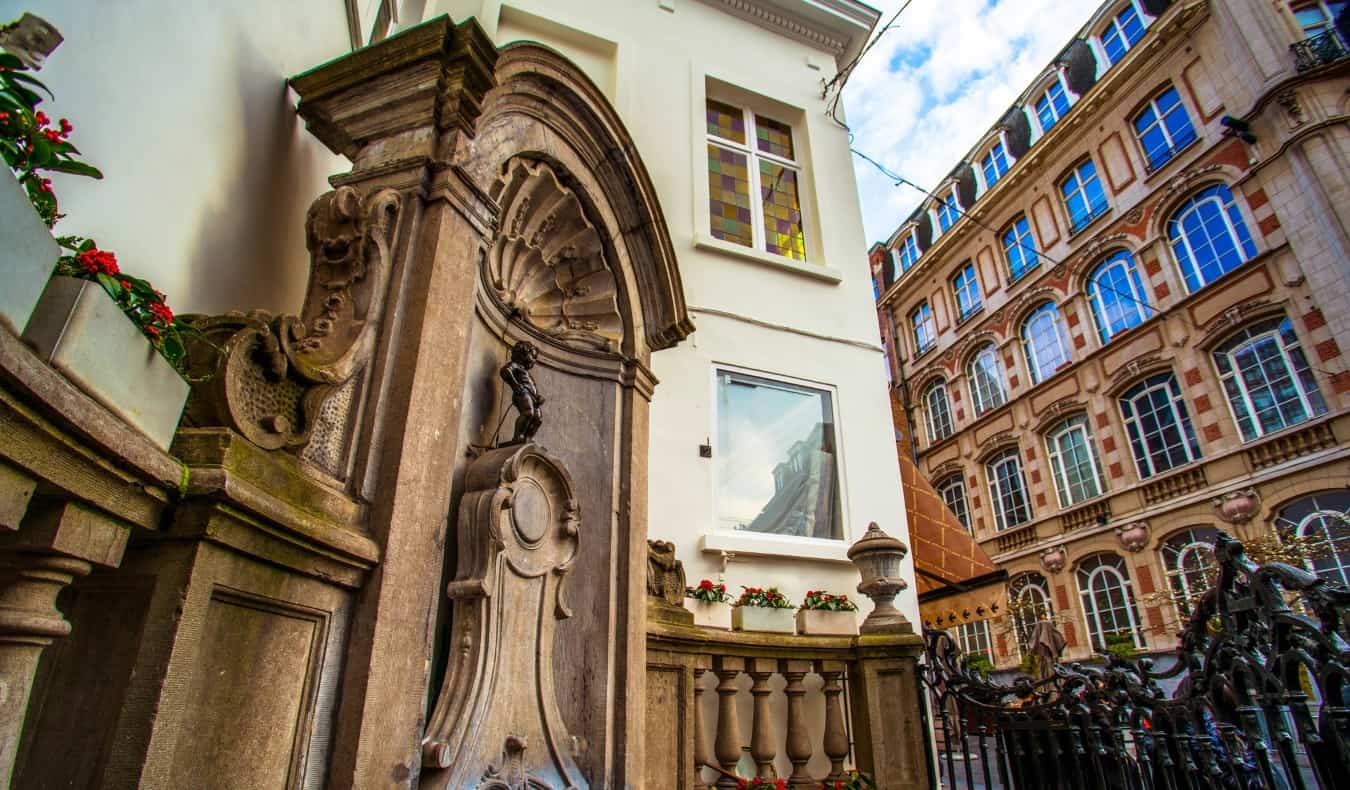 Manneken Pis, the statue of a little boy peeing into a fountain, the icon of Brussels, Belgium