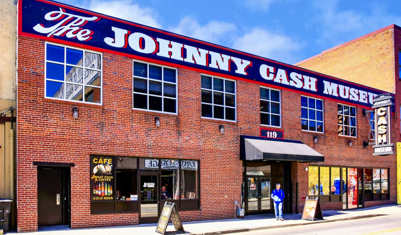 The exterior of the Johnny Cash Museum on a sunny day in Nashville, TN, USA