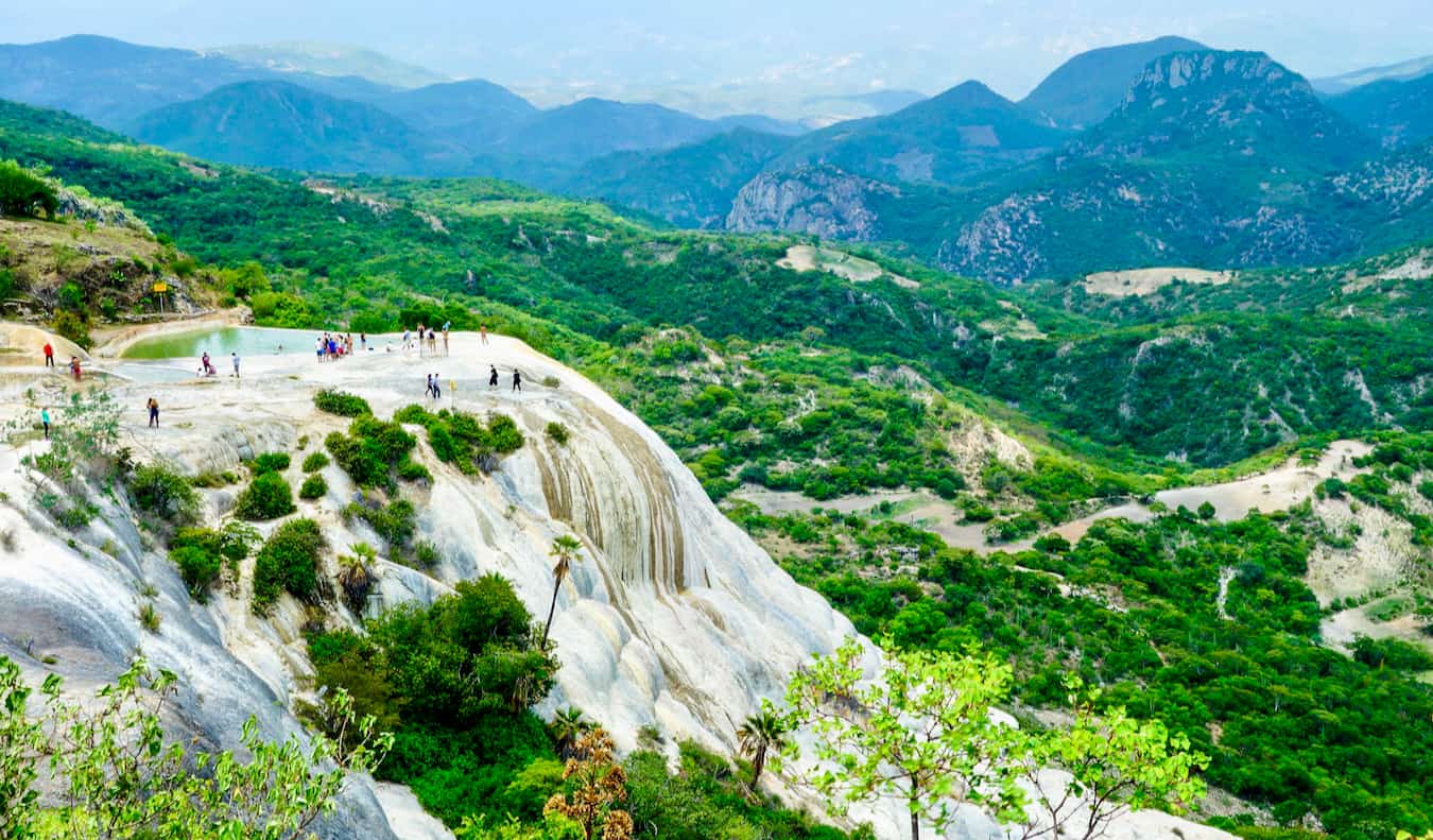 People swimming at the Hierve el Agua pools and falls near Oaxaca, Mexico