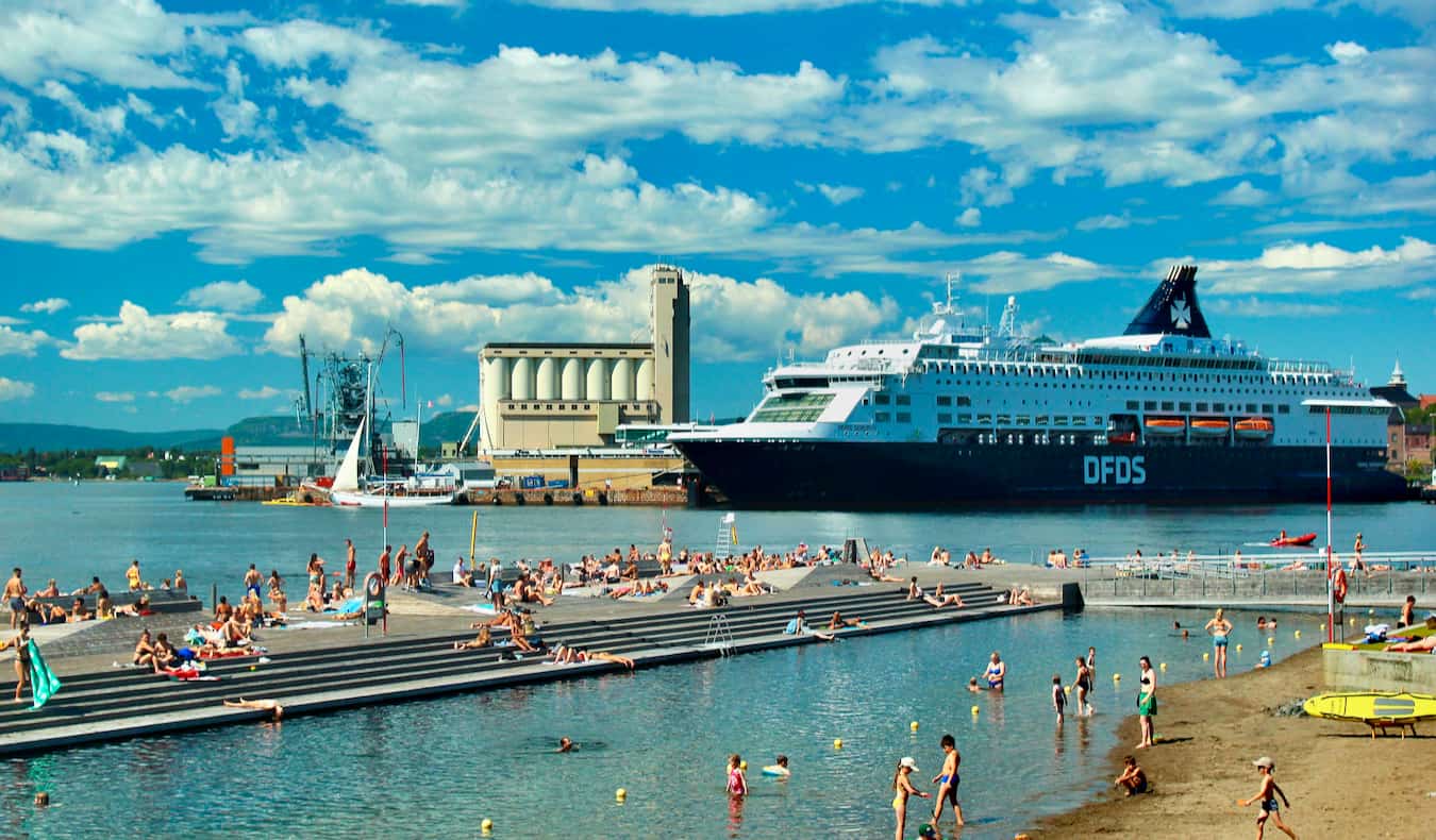 people swimming in the harbor on a warm, sunny day in beautiful Oslo, Norway