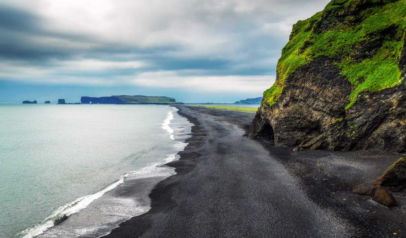 Desolate Reynisfjara, the black sand beach in Iceland