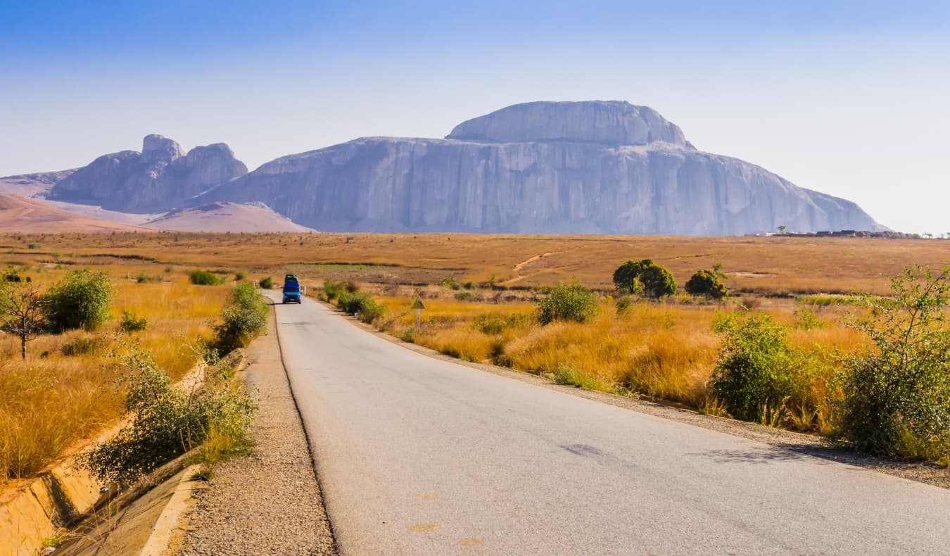 scenic view of Route Nationale 7 (RN7) in Madagascar, with Cardinal's hat, a huge granite mountain, in the background