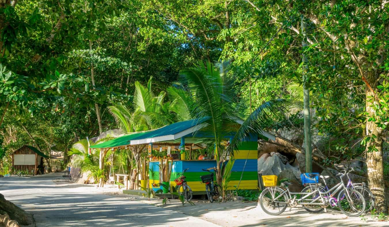 A roadside stand with bikes parked out front in the Seychelles