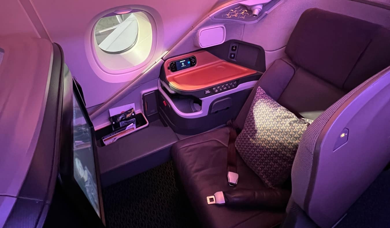 Spacious seat in business class on an airplane