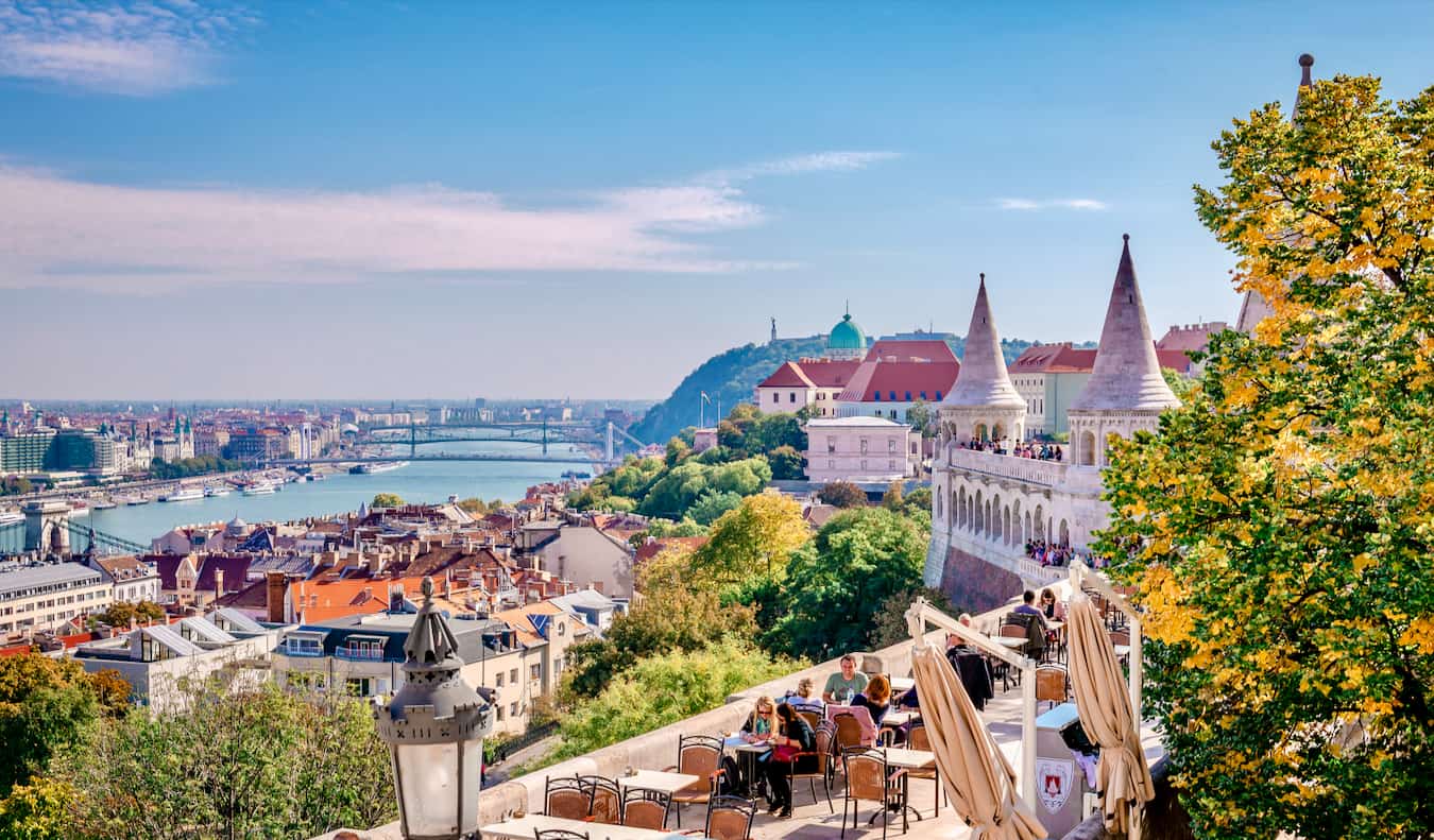 People enjoying the sweeping view over Budapest, Hungary on a sunny day