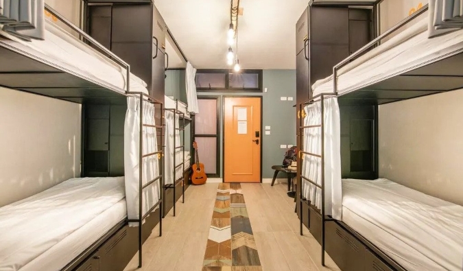 Pod-style beds in a room at The Spot hostel in Tel Aviv, Israel