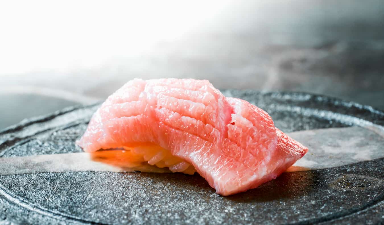 Fresh sushi in Tokyo, Japan on a plate waiting to be eaten