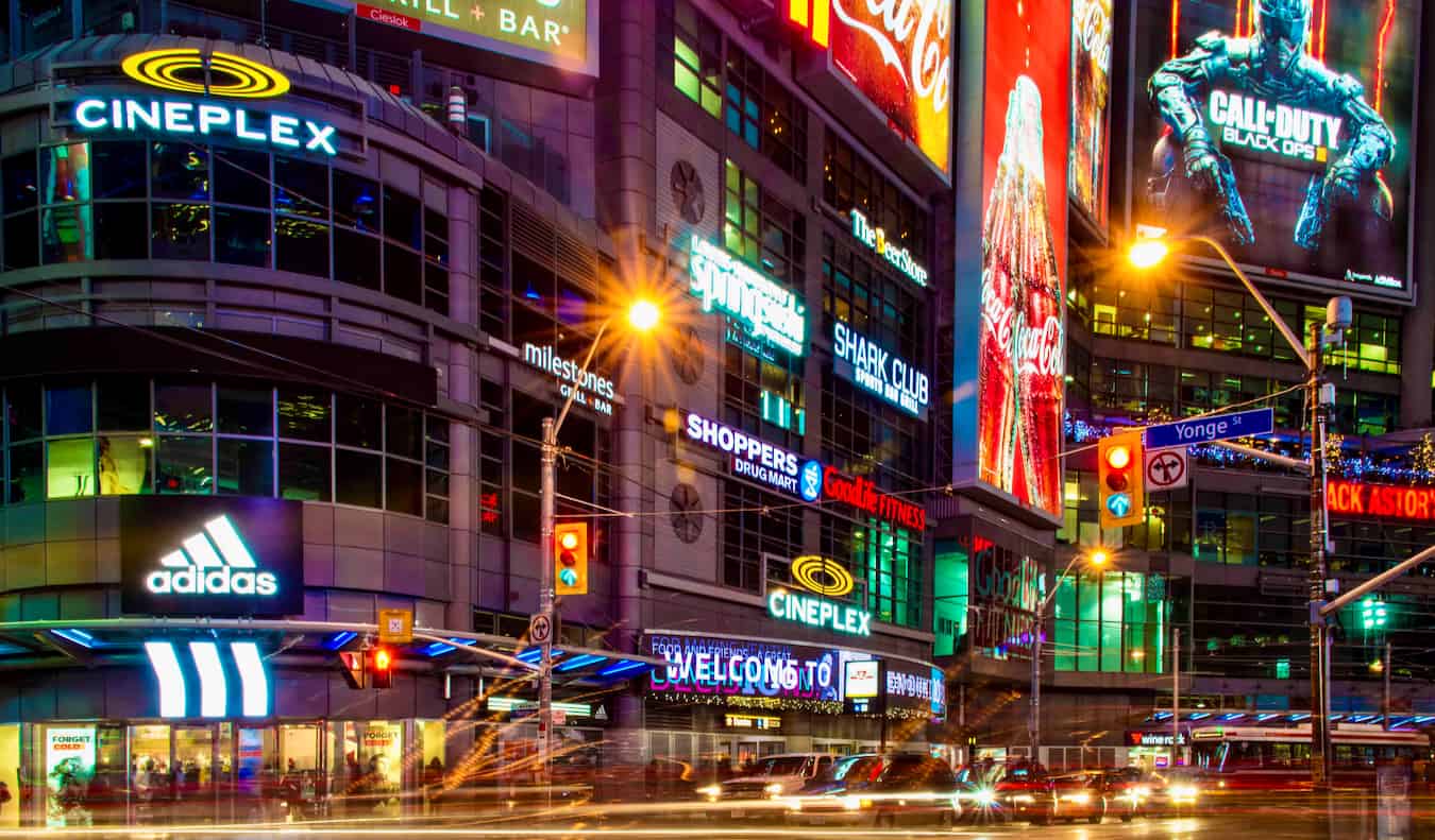 The bright and busy Eaton Center in Toronto, Canada all lit up at night