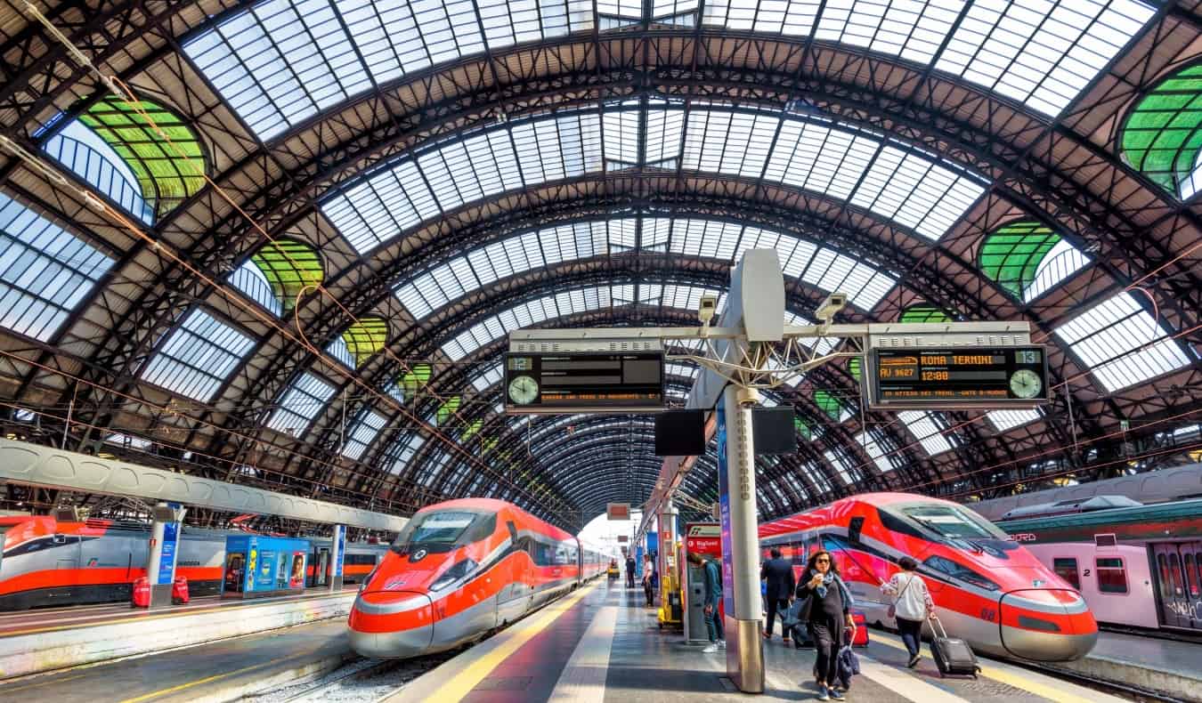 High speed trains waiting for departure on platforms at the train station in Milan, Italy