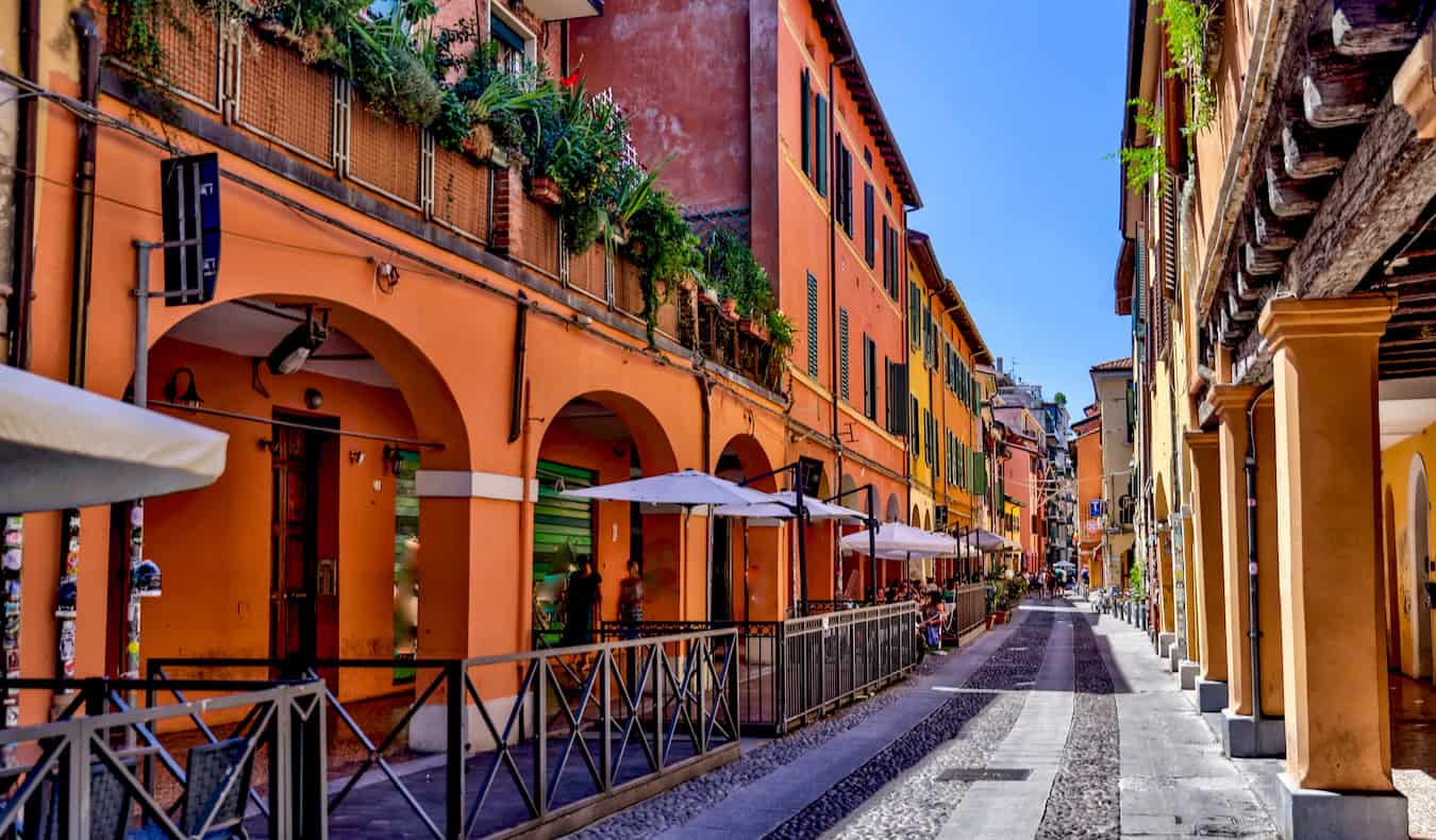 A quiet street in sunny Bologna, Italy during a walking tour