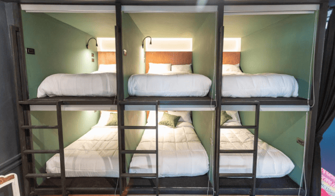 Capsule-style beds at Casa Tunki, a luxury hostel in Cusco, Peru