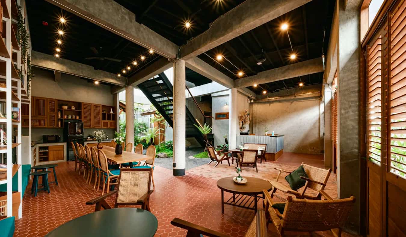 The cool lobby and common area of the Hidden Garden Hostel in Chiang Mai, Thailand
