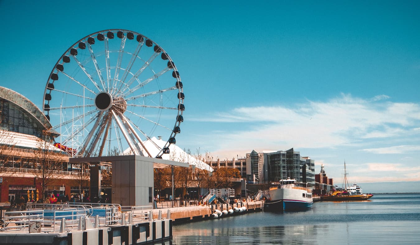 The fun and quirky Navy Pier with a tall Ferris wheel on the coast of Chicago, USA