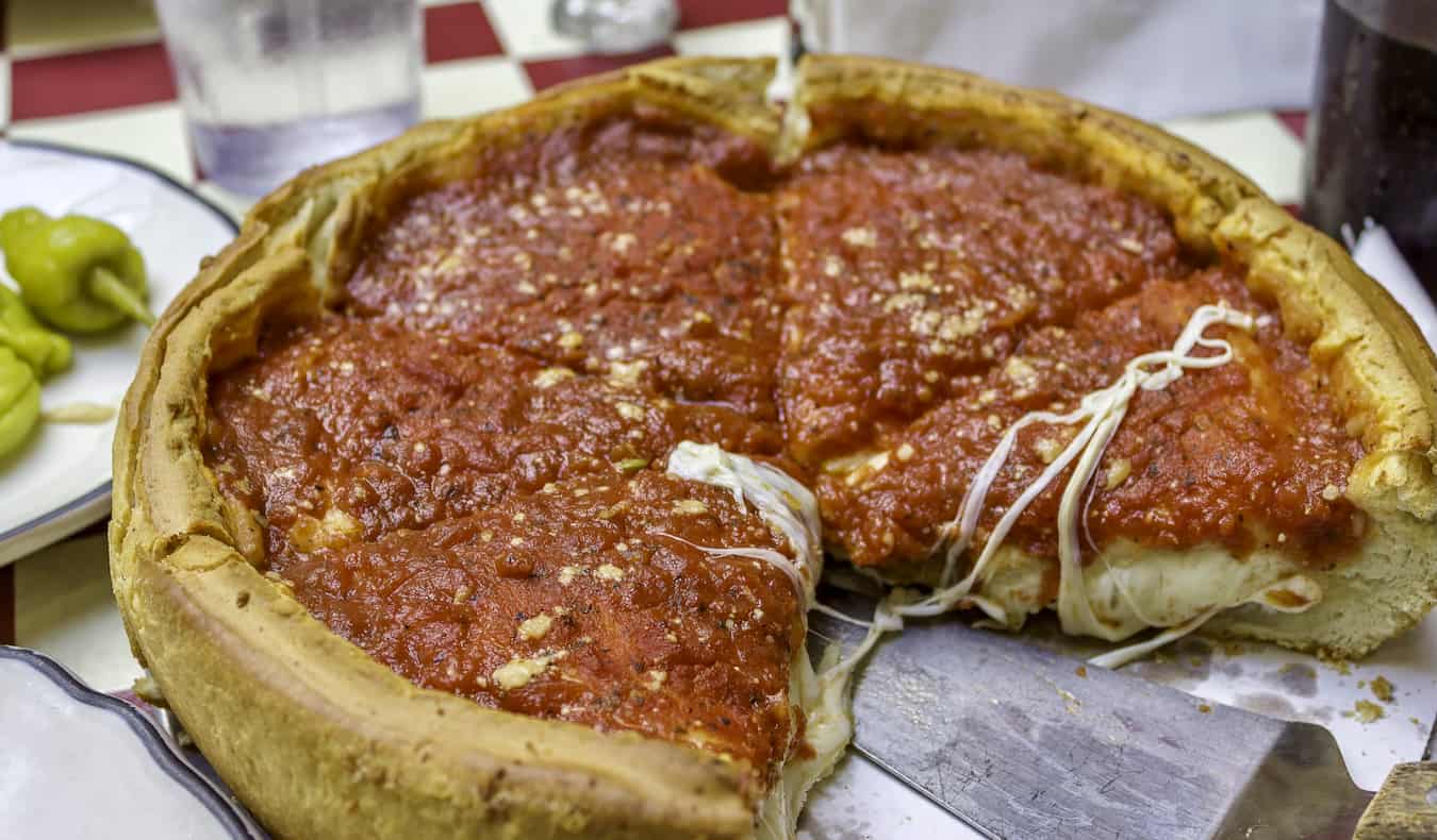 A delicious deep-dish pizza made in the Chicago style in Chicago, USA