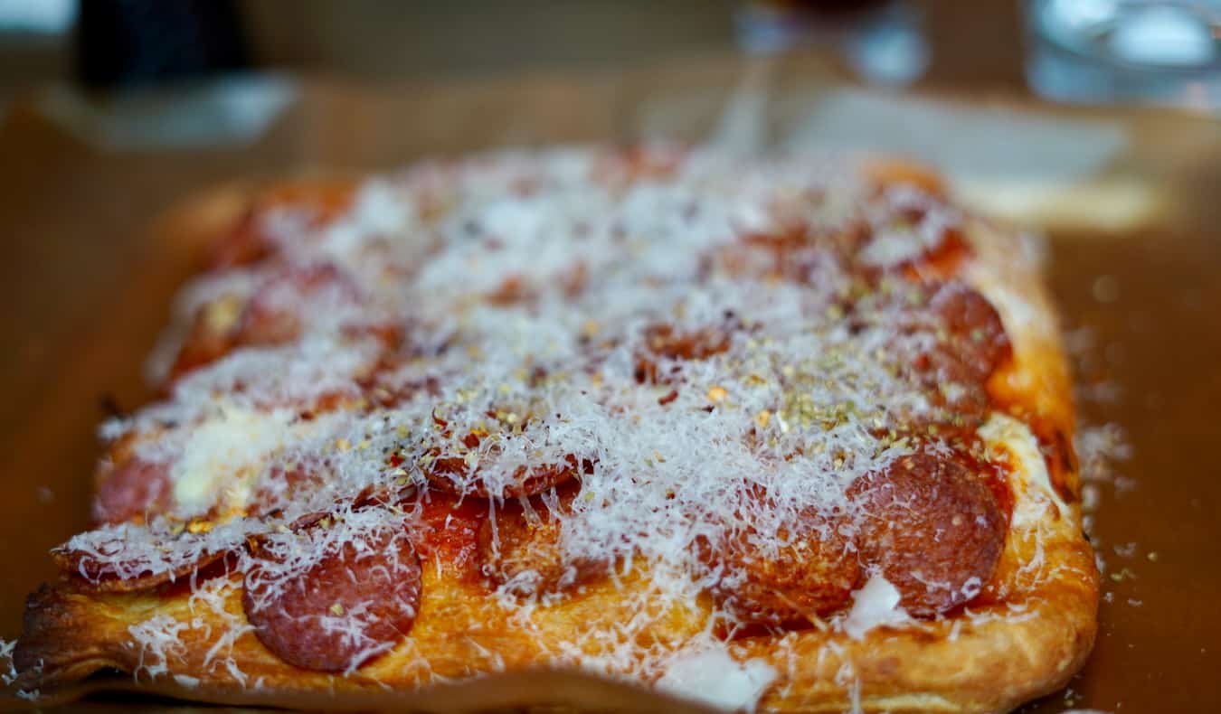 A fresh Detroit-style pizza on a table in Detroit, Michigan