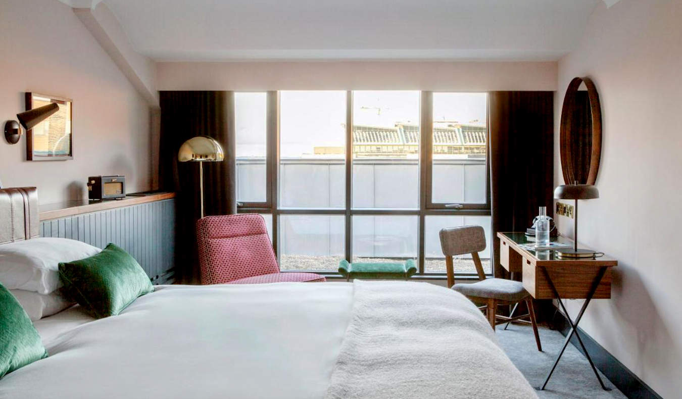 A small, minimalist hotel room at The Alex hotel in Dublin, Ireland