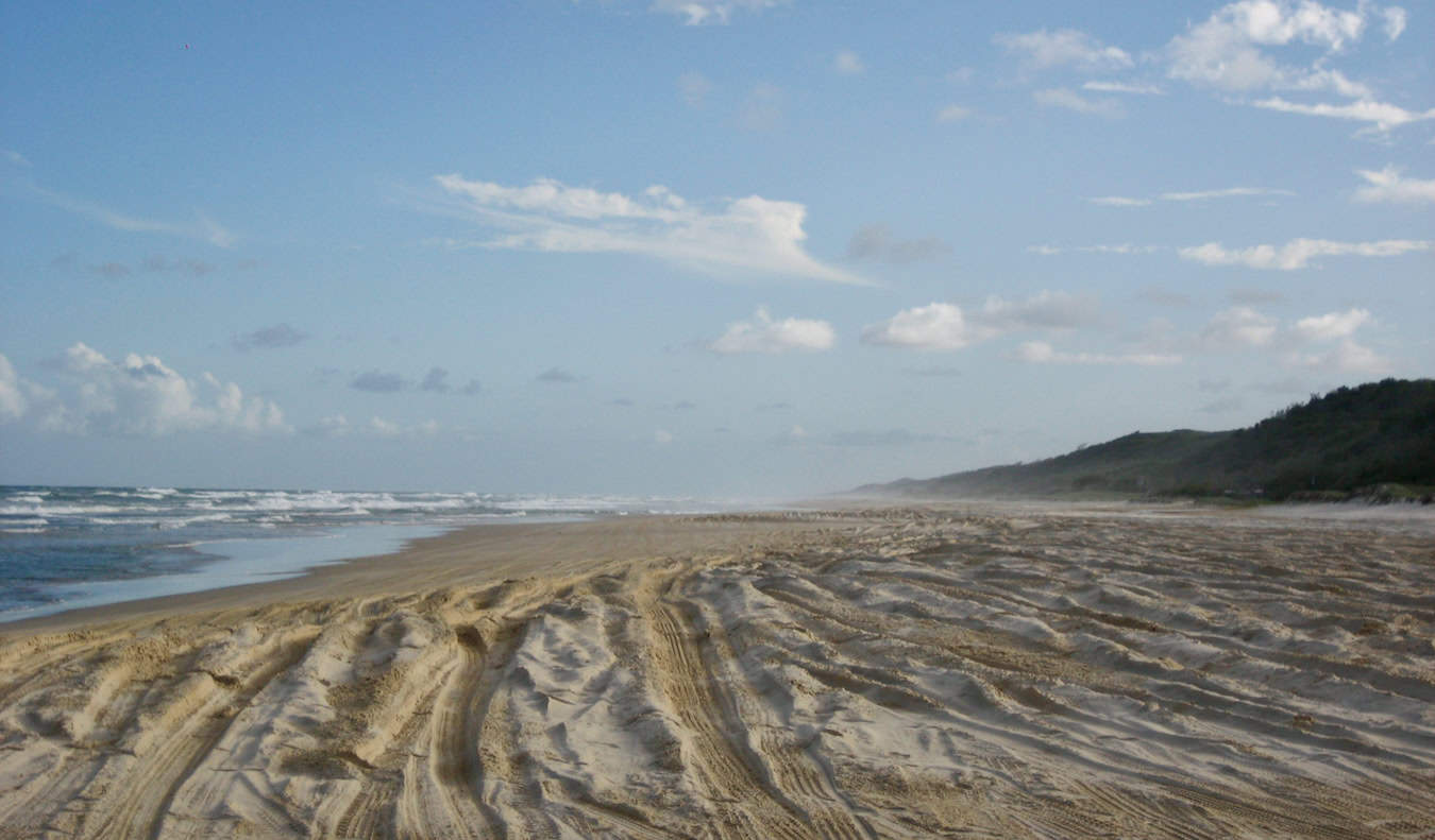 A sprawling, wide open beach on Fraser Island in sunny Australia