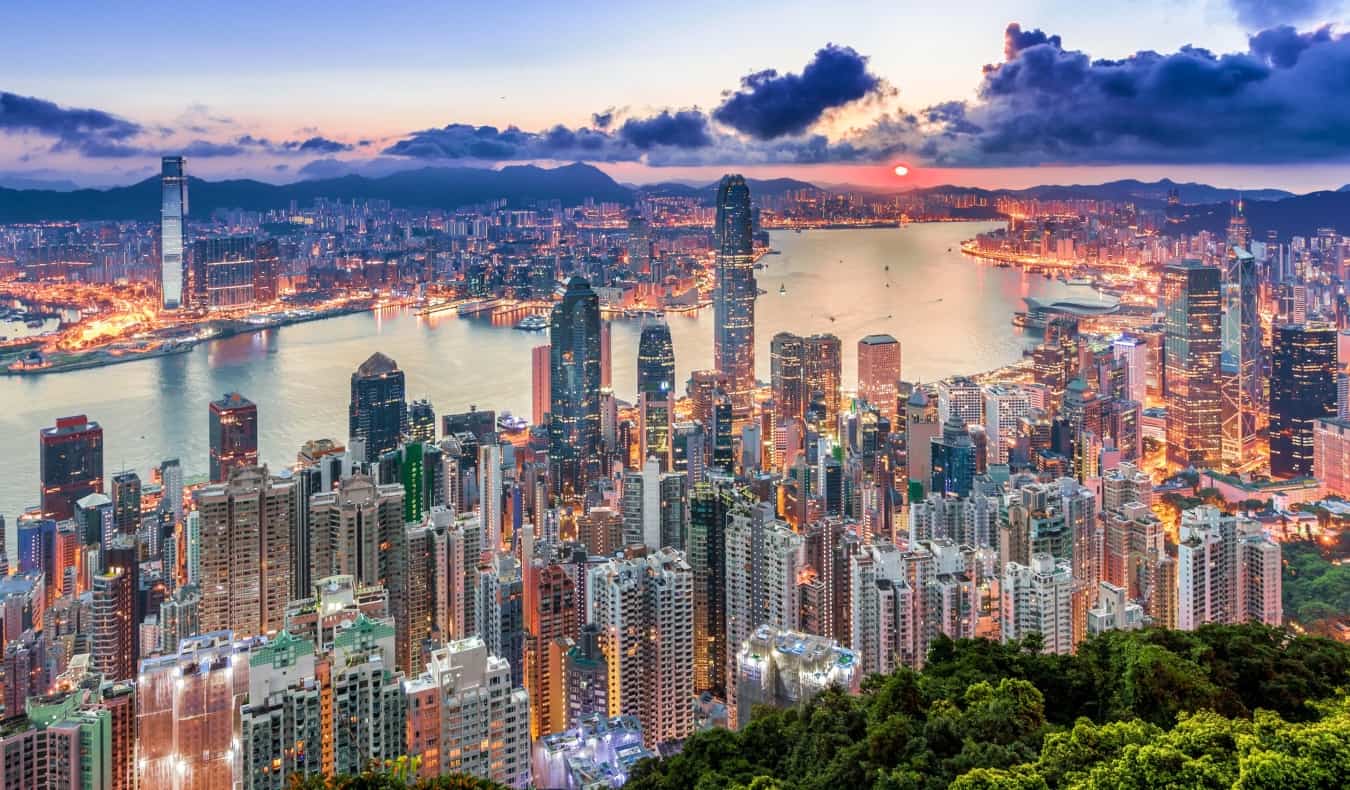 The massive and towering skyline of Hong Kong at sunrise