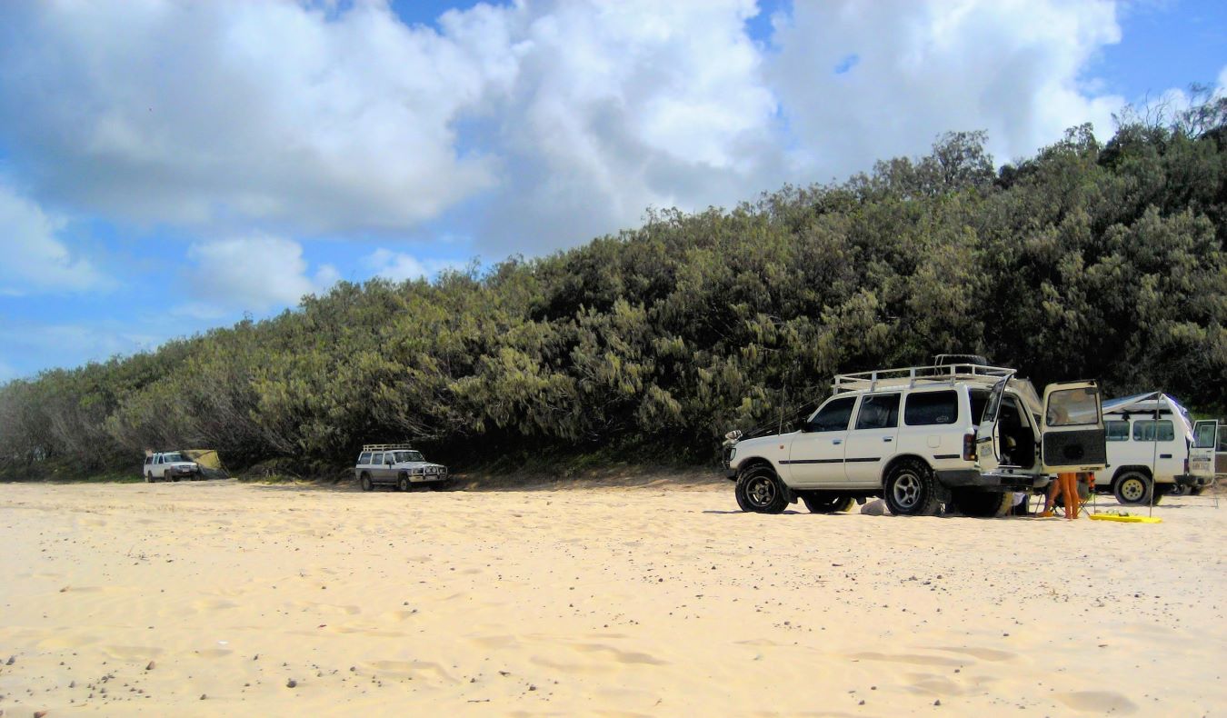 Landrovers on a beach in Australia