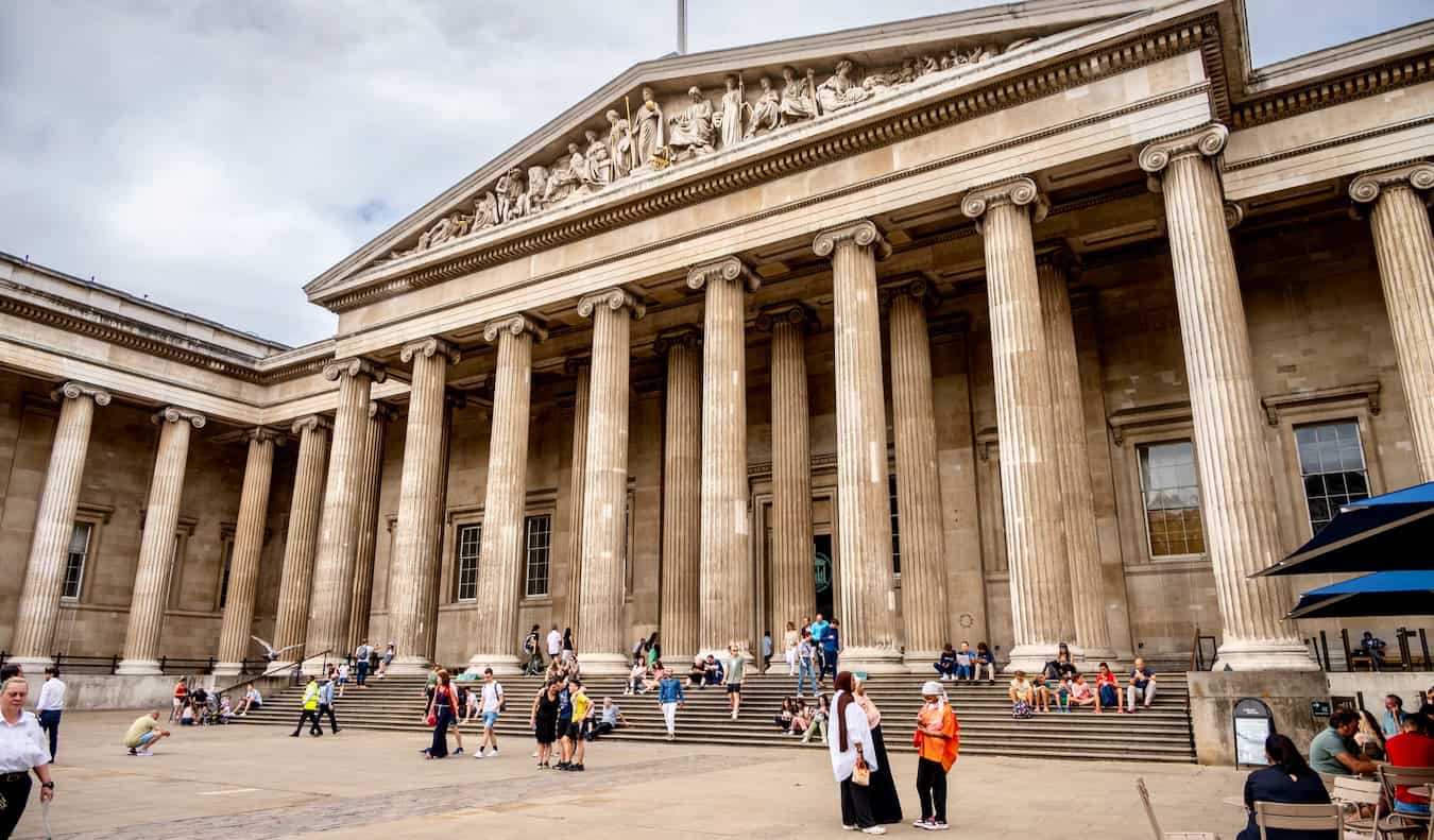 The historic exterior of the massive and popular London British Museum in London, England