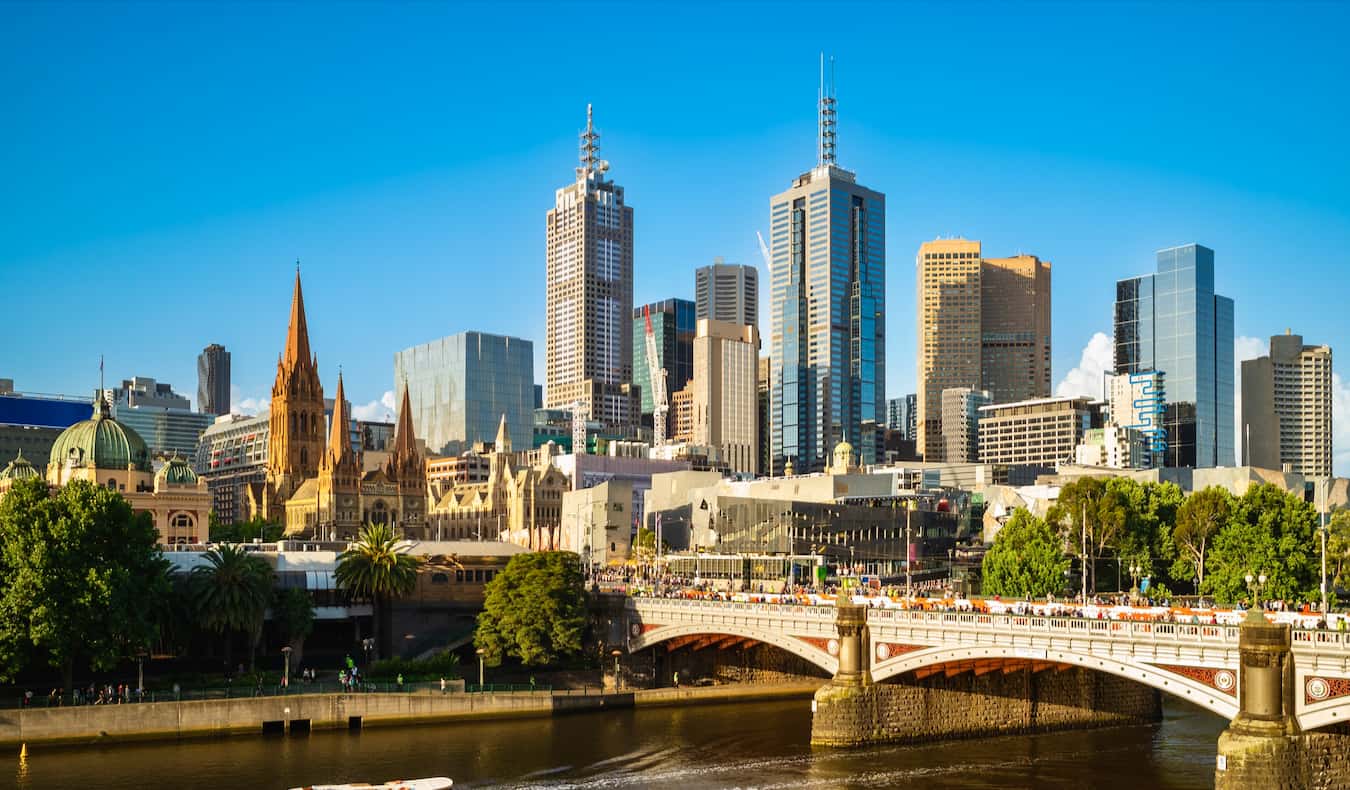 The towering skyline of Melbourne, Australia on a bright summer day