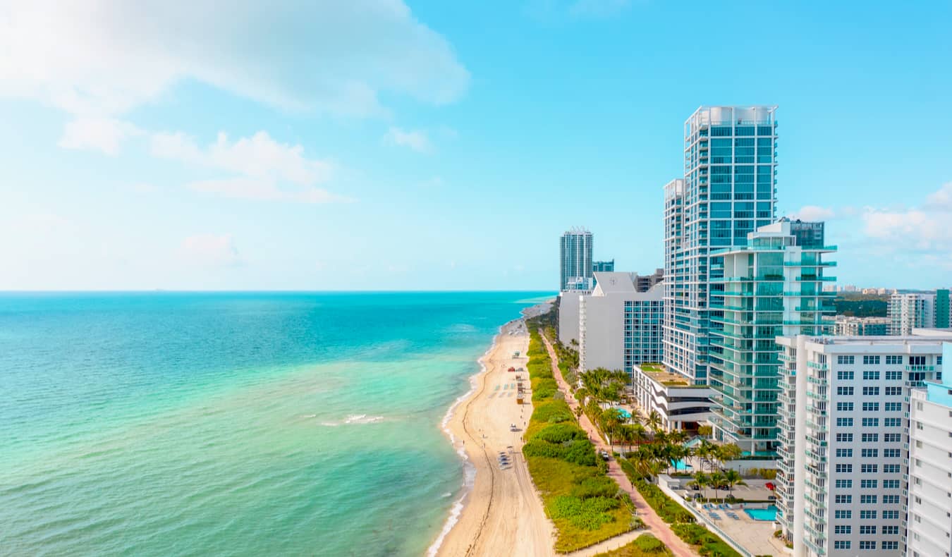 The view overlooking South Beach in Miami, with towering hotels lining the long, sandy beach by the ocean