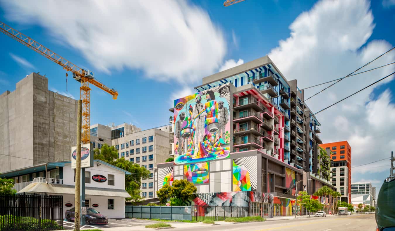 A building covered in a bright, colorful mural in Wynwood, Miami
