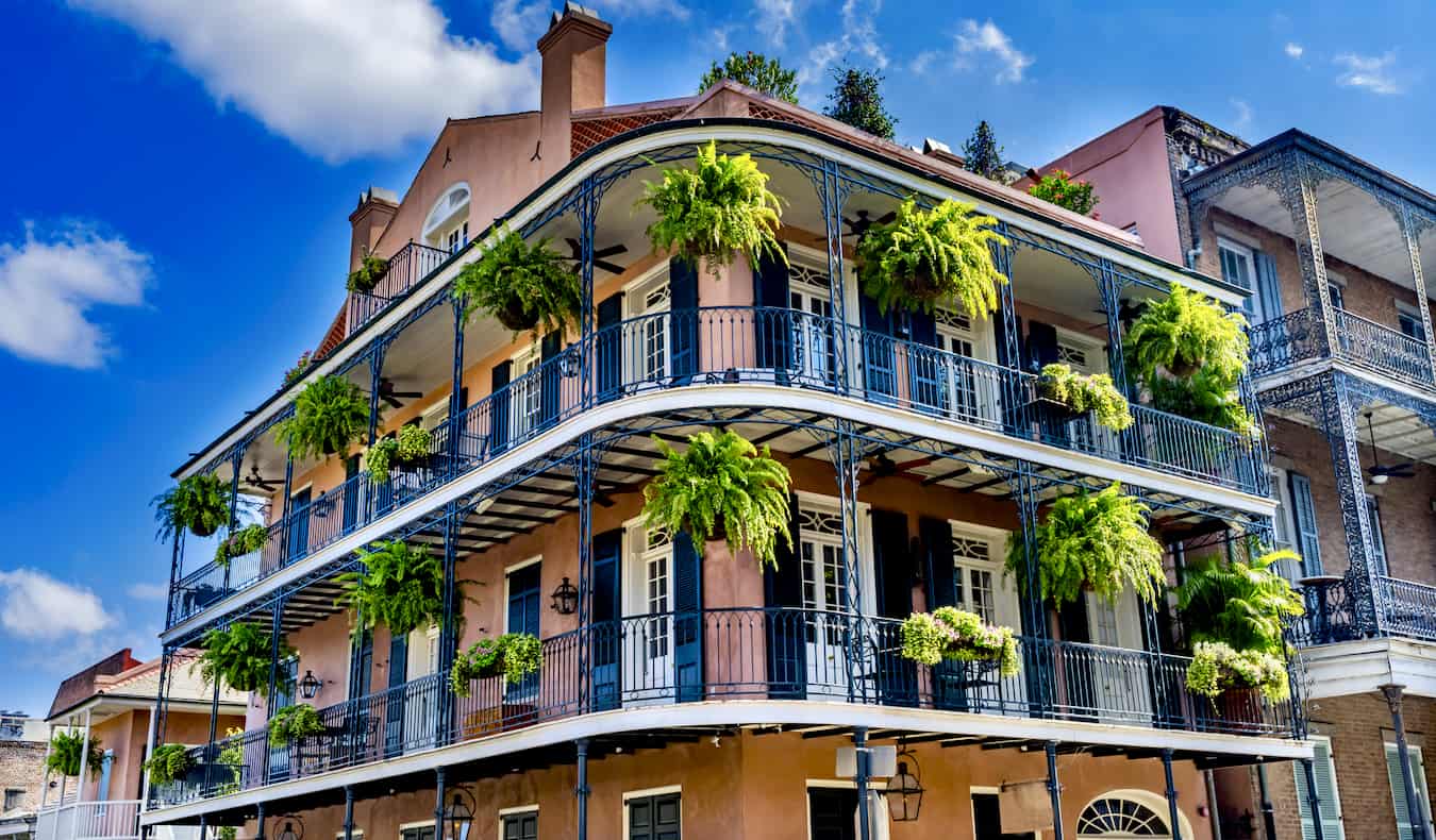 A large, historic building in the French Quarter in New Orleans, USA on a sunny day