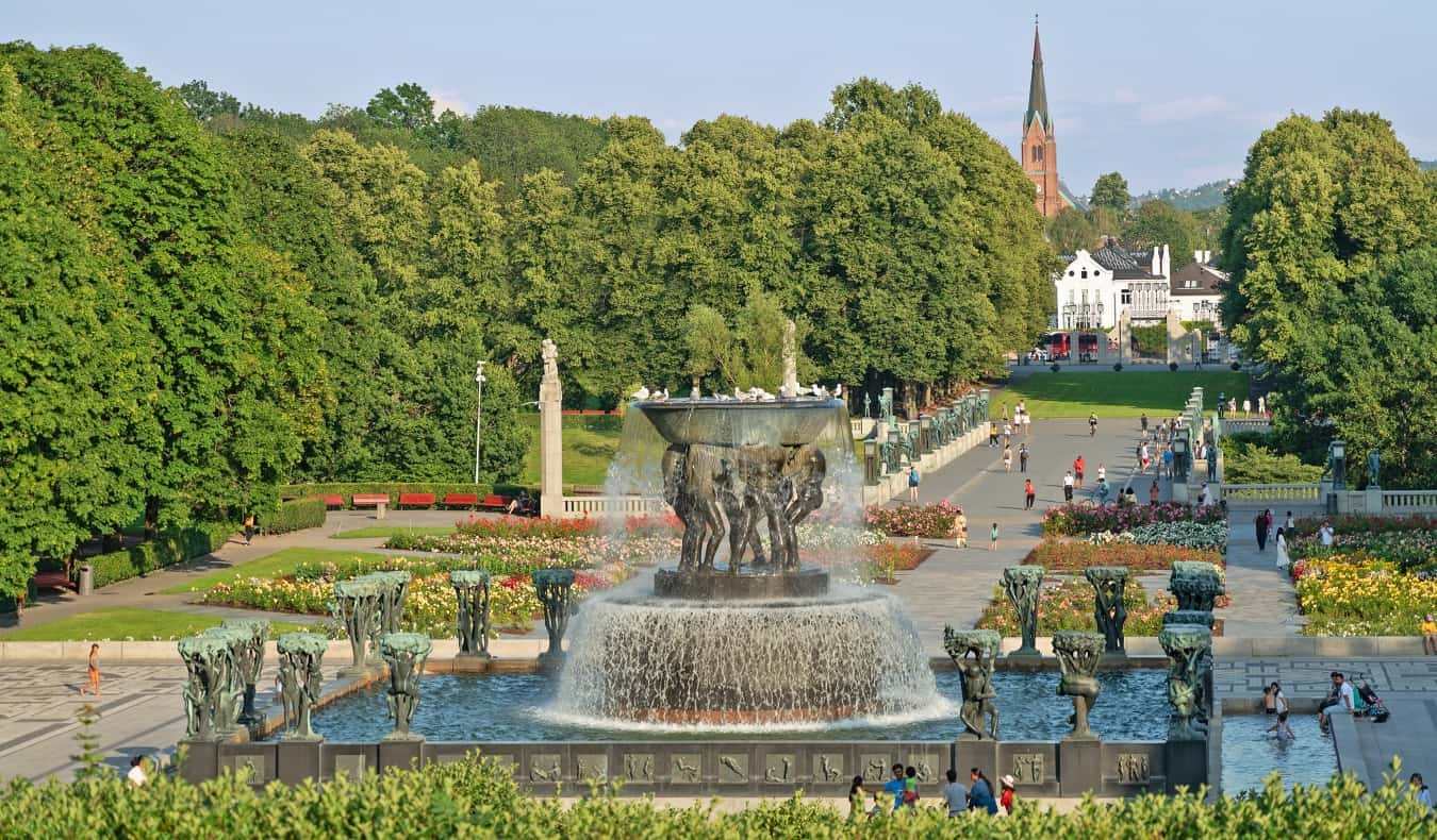 The well-manicured Vigeland Park with a fountain of sculptures in the middle in Oslo, Norway