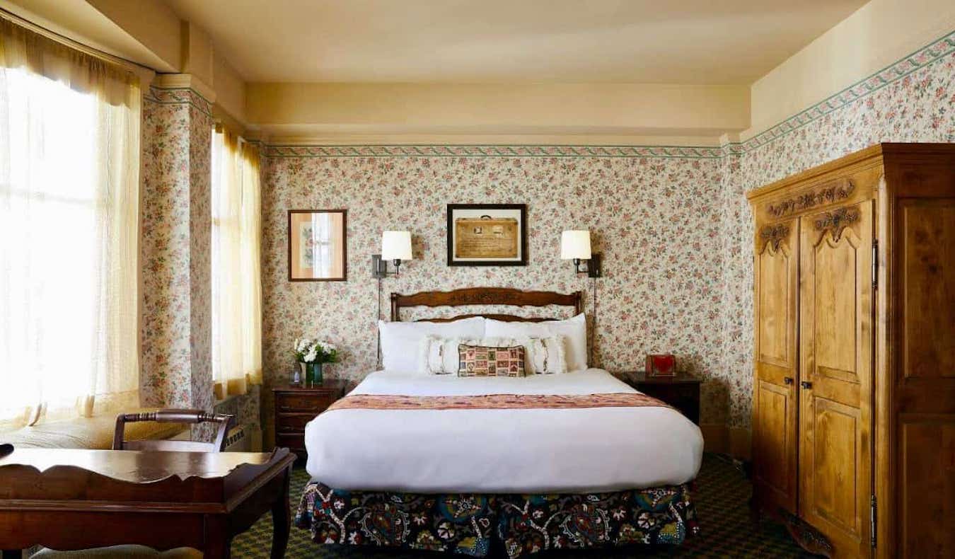 A cozy B&B room at the charming Petite Auberge hotel in San Francisco, USA