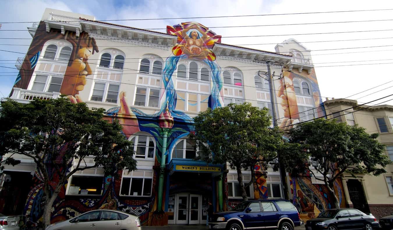 A building decorated with a large mural in the Mission District in San Francisco, USA