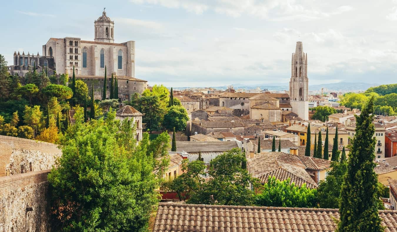 View over the terracotta rooftops, with the cathedral rising above it all in Girona, Spain