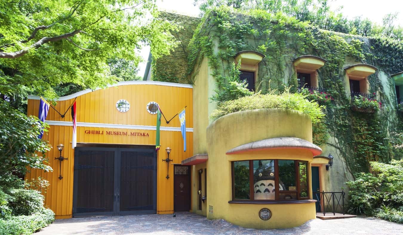 The Ghibli Museum covered in ivy with a giant Totoro statue in the window near Tokyo in Japan