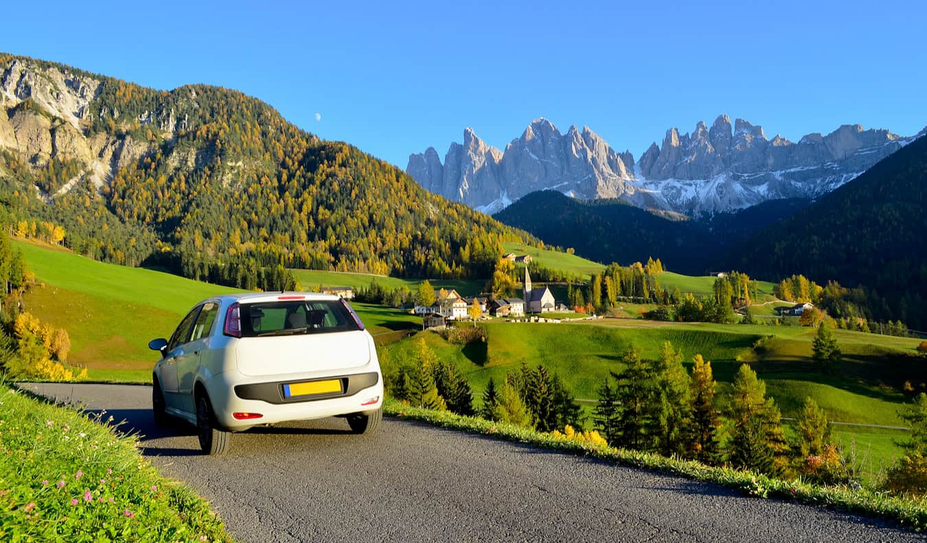 A car driving down a road in Europe