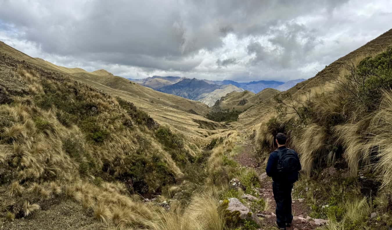 Nomadic Matt posing for a photo while hiking on the Inca Trail to Machu Picchu