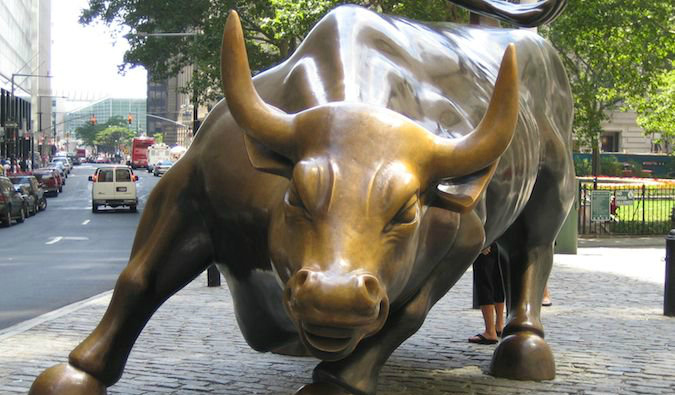 Close up of bronze bull statue on Wall Street in NYC