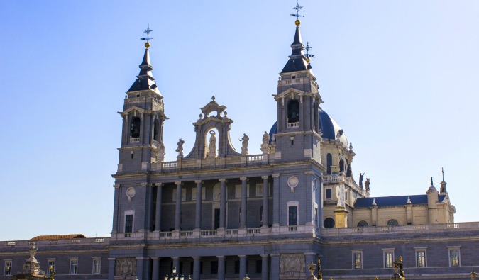 The Cathedral of Madrid on a bright, sunny day in Madrid, Spain with a blue sky in the background