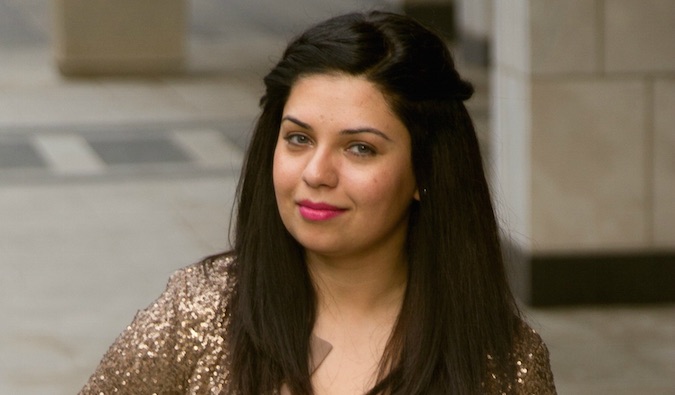 Closeup of a female who loves to travel, pink lips