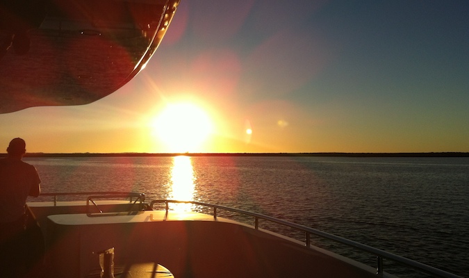 a yacht during sunset