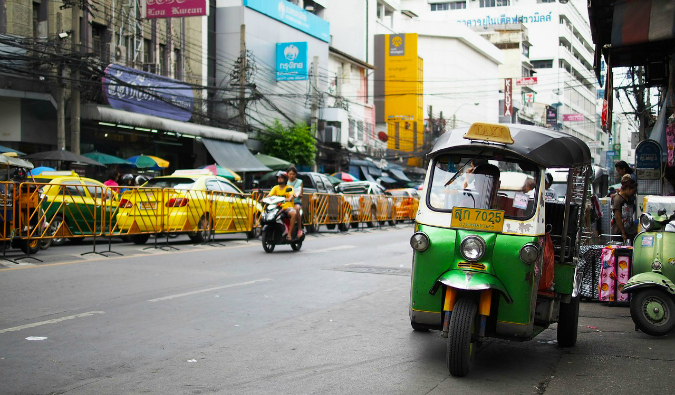 Tuk-tuks on a busy street in Bangkok