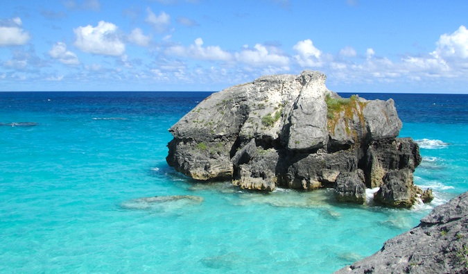 Rock in the clear blue ocean water of the Caribbean