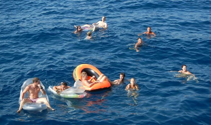 jumping off the busabout boat in Croatia