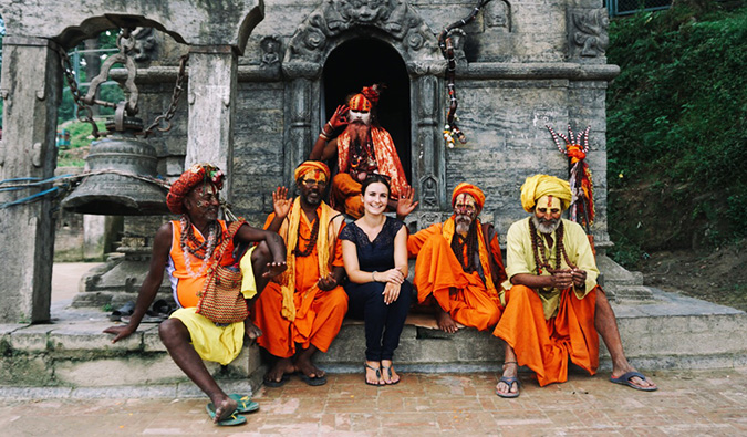 Celinne da Costa posing at a temple