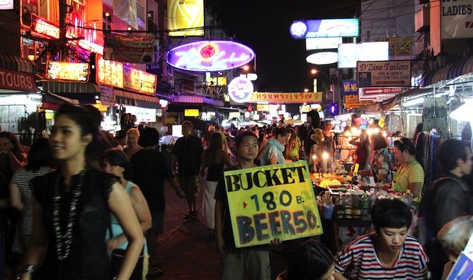 Crowded tourist travelers on Khao San Road in Bangkok, Thailand