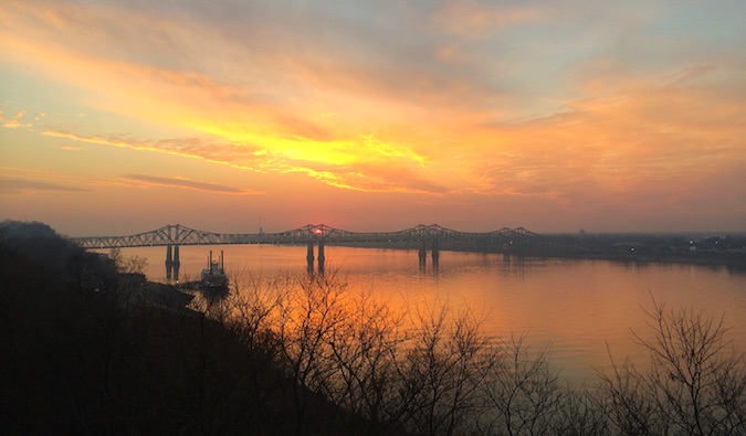 A sunset overlooking a bridge in America