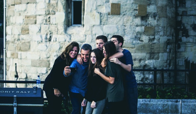 a group of travelers posing for a selfie together