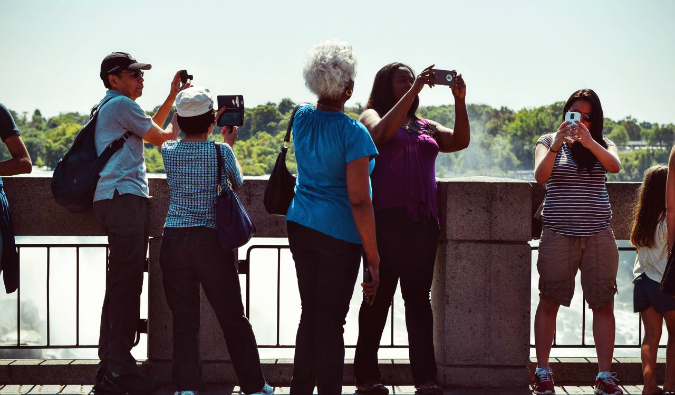 a group of tourists taking photos
