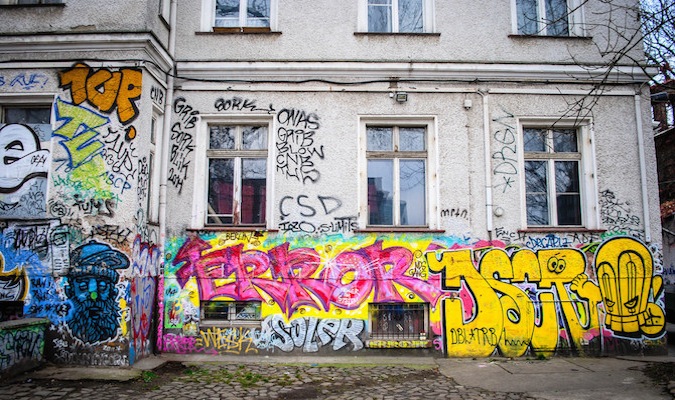 Street art and graffiti on the walls of an empty street overseas