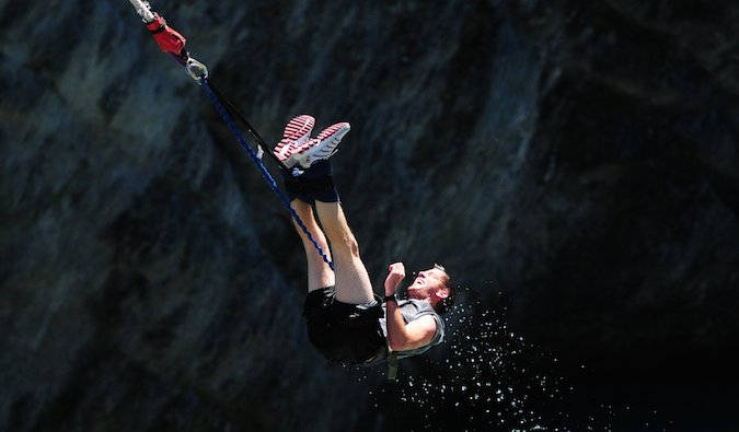Steve Kamb bungee jumping during travels