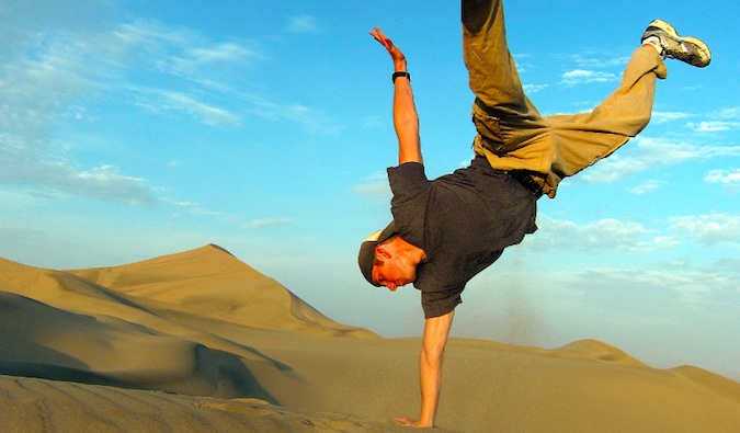 Getting an unconventional workout in at the sand dunes while traveling